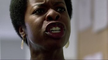 Movie still from “Detachment” (2011), directed by Tony Kaye – A woman's face with her mouth wide open; Close Up shot, Low angle
