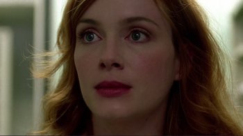 Movie still from “Detachment” (2011), directed by Tony Kaye – A woman's face with red hair; Close Up shot, Over the shoulder angle