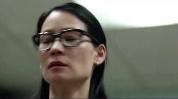 Movie still from “Detachment” (2011), directed by Tony Kaye – A person wearing glasses with their eyes closed; Close Up shot, Low angle