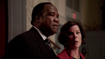 Movie still from “Detachment” (2011), directed by Tony Kaye – A man and a woman standing next to each other; Close Up shot, Low angle