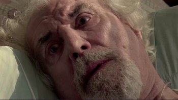 Movie still from “Detachment” (2011), directed by Tony Kaye – An old man with a beard and a white beard; Extreme Close Up shot, Overhead angle