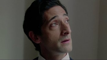 Movie still from “Detachment” (2011), directed by Tony Kaye – A person wearing a suit and tie; Close Up shot, High angle