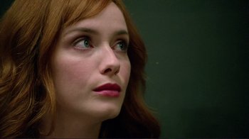 Movie still from “Detachment” (2011), directed by Tony Kaye – A person with red hair and green eyes; Close Up shot, Low angle