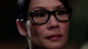 Movie still from “Detachment” (2011), directed by Tony Kaye – A person wearing glasses; Close Up shot, Over the shoulder angle