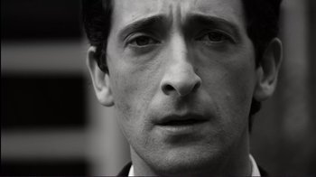 Movie still from “Detachment” (2011), directed by Tony Kaye – Black and white photograph of a man's face; Close Up shot, Low angle