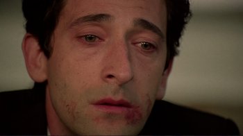 Movie still from “Detachment” (2011), directed by Tony Kaye – A man's face with blood all over his face; Close Up shot, Low angle