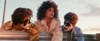 Movie still from “Detroit Rock City” (1999), directed by Adam Rifkin – A group of people standing next to each other; Medium shot, Over the shoulder angle