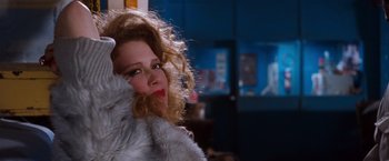 Movie still from “Detroit Rock City” (1999), directed by Adam Rifkin – A person wearing a fur coat; Close Up shot, Over the shoulder angle