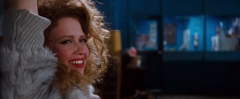 Movie still from “Detroit Rock City” (1999), directed by Adam Rifkin – A person with a smile on their face; Close Up shot, Over the shoulder angle