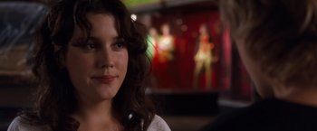 Movie still from “Detroit Rock City” (1999), directed by Adam Rifkin – A person wearing a white shirt; Close Up shot, Over the shoulder angle