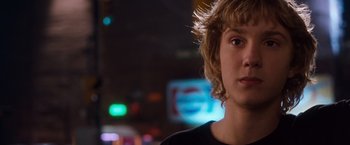 Movie still from “Detroit Rock City” (1999), directed by Adam Rifkin – A person's face at night time; Close Up shot, Over the shoulder angle