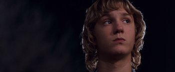 Movie still from “Detroit Rock City” (1999), directed by Adam Rifkin – A person looking up at the sky; Close Up shot, Low angle