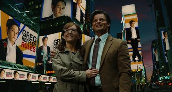 Movie still from “Diary of a Wimpy Kid” (2010), directed by Thor Freudenthal – A man and a woman standing next to each other; Medium shot, Over the shoulder angle