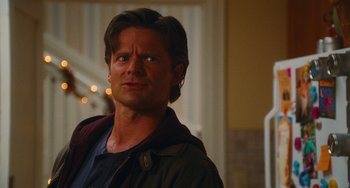 Movie still from “Diary of a Wimpy Kid” (2010), directed by Thor Freudenthal – A person wearing a jacket; Close Up shot, Over the shoulder angle