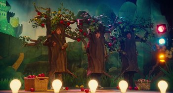 Movie still from “Diary of a Wimpy Kid” (2010), directed by Thor Freudenthal – A group of people standing next to each other on a stage; Wide shot, Low angle