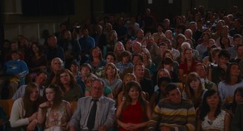 Movie still from “Diary of a Wimpy Kid” (2010), directed by Thor Freudenthal – A large group of people sitting in a room; Wide shot, High angle