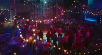 Movie still from “Diary of a Wimpy Kid” (2010), directed by Thor Freudenthal – A group of people standing around a dance floor; Extreme Wide shot, High angle