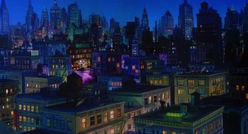 Movie still from “Dick Tracy” (1990), directed by Warren Beatty – A painting of a city at night with lights on buildings; Extreme Wide shot, High angle