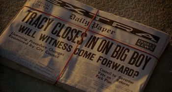 Movie still from “Dick Tracy” (1990), directed by Warren Beatty – The front page of a newspaper; Extreme Close Up shot, High angle