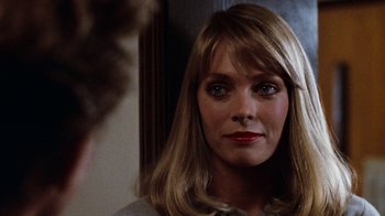 Movie still from “Diner” (1982), directed by Barry Levinson – A person looking at a mirror; Close Up shot, Over the shoulder angle