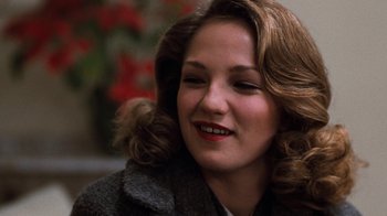 Movie still from “Diner” (1982), directed by Barry Levinson – A person wearing a coat; Close Up shot, Over the shoulder angle