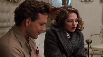 Movie still from “Diner” (1982), directed by Barry Levinson – A man and a woman sitting next to each other; Close Up shot, Over the shoulder angle