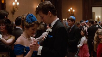 Movie still from “Diner” (1982), directed by Barry Levinson – A man and a woman in formal wear dancing together; Medium shot, Low angle