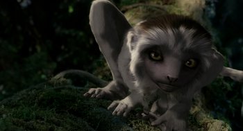 Movie still from “Dinosaur” (2000), directed by Eric Leighton – An animal that is sitting in the grass; Close Up shot, High angle