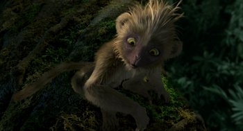 Movie still from “Dinosaur” (2000), directed by Eric Leighton – An animal that is sitting in the grass; Close Up shot, High angle