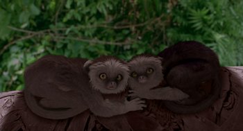 Movie still from “Dinosaur” (2000), directed by Eric Leighton – A couple of monkeys that are sitting on a tree; Close Up shot, Overhead angle