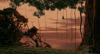 Movie still from “Dinosaur” (2000), directed by Eric Leighton – A view of a body of water and a tree; Extreme Wide shot, Low angle