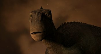 Movie still from “Dinosaur” (2000), directed by Eric Leighton – An image of an animal that is looking at the camera; Close Up shot, Low angle