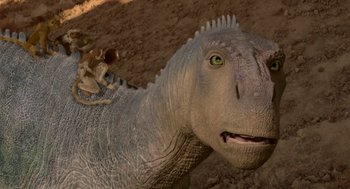 Movie still from “Dinosaur” (2000), directed by Eric Leighton – The head of a toy dinosaur; Close Up shot, Low angle