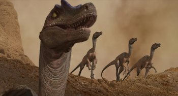 Movie still from “Dinosaur” (2000), directed by Eric Leighton – A group of dinosaurs walking in the dirt; Wide shot, Low angle