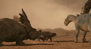 Movie still from “Dinosaur” (2000), directed by Eric Leighton – A group of dinosaurs in a desert setting; Wide shot, Low angle