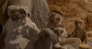 Movie still from “Dinosaur” (2000), directed by Eric Leighton – A monkey with a baby monkey on its back; Close Up shot, Low angle