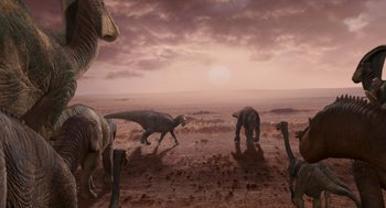 Movie still from “Dinosaur” (2000), directed by Eric Leighton – A group of dinosaurs walking across a dirt field; Extreme Wide shot, High angle