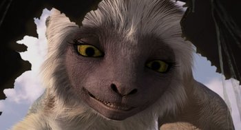 Movie still from “Dinosaur” (2000), directed by Eric Leighton – The face of an animal with yellow eyes; Extreme Close Up shot, High angle