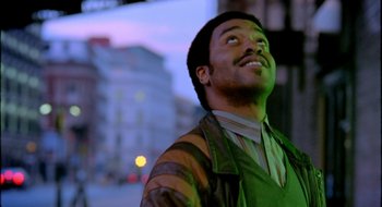 Movie still from “Dirty Pretty Things” (2002), directed by Stephen Frears – A person looking up at the sky; Close Up shot, Low angle