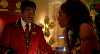 Movie still from “Dirty Pretty Things” (2002), directed by Stephen Frears – A man and a woman talking to each other in a room; Medium shot, Over the shoulder angle