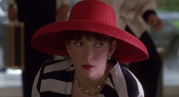 Movie still from “Dirty Rotten Scoundrels” (1988), directed by Frank Oz – A person wearing a hat; Close Up shot, High angle