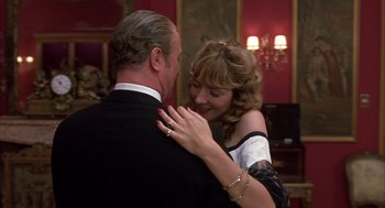 Movie still from “Dirty Rotten Scoundrels” (1988), directed by Frank Oz – A man and a woman are dancing together; Close Up shot, Over the shoulder angle