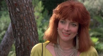 Movie still from “Dirty Rotten Scoundrels” (1988), directed by Frank Oz – A person with red hair; Close Up shot, Low angle