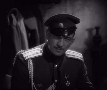 Movie still from “Dishonored” (1931), directed by Josef von Sternberg – A black and white photo of a man in a military uniform; Close Up shot, High angle