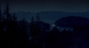 Movie still from “Disturbing Behavior” (1998), directed by David Nutter – A view of a body of water at night; Extreme Wide shot, High angle