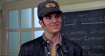 Movie still from “Disturbing Behavior” (1998), directed by David Nutter – A young man wearing a hat and leather jacket; Close Up shot, Over the shoulder angle