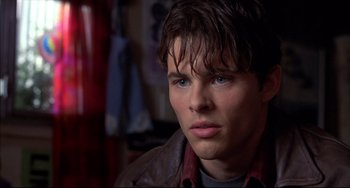 Movie still from “Disturbing Behavior” (1998), directed by David Nutter – A person wearing a brown jacket; Close Up shot, Over the shoulder angle