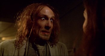 Movie still from “Disturbing Behavior” (1998), directed by David Nutter – A person with long brown hair; Close Up shot, Low angle