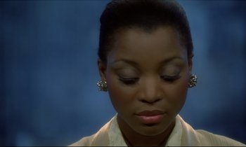 Movie still from “Diva” (1981), directed by Jean-Jacques Beineix – A person with eyes closed; Close Up shot, High angle