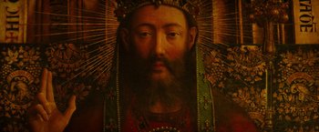 Movie still from “The Monuments Men” (2014), directed by George Clooney – A painting of a bearded man wearing a crown; Close Up shot, Overhead angle